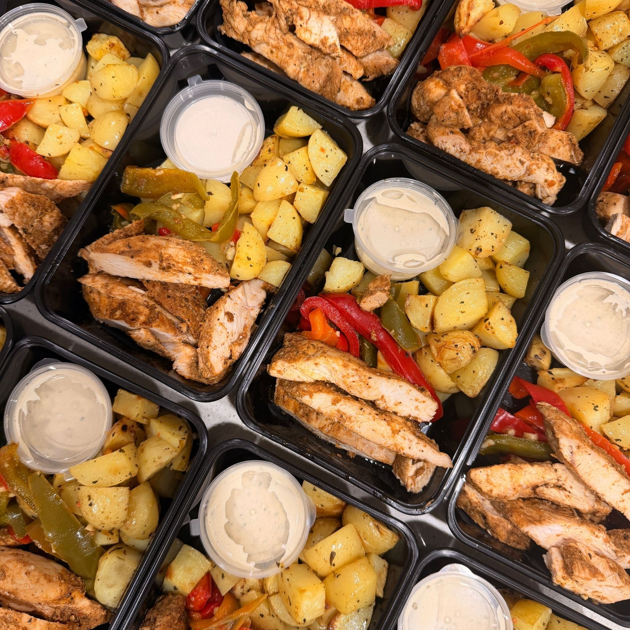 Cajun Chicken with Sautéed Veggies & Baked Potatoes